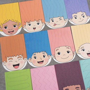 May include: A collection of colorful paper cutouts featuring cartoon faces with long hair in various colors. Each face has a different expression, and the hair extends down onto a rectangular section with dotted lines.