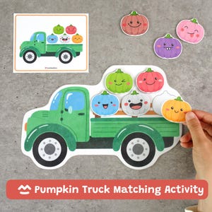 May include: A green truck cutout with a flatbed for placing small, colorful pumpkin-shaped pieces. The set includes a matching card featuring a green truck with five pumpkins, plus several individual pumpkin cutouts with various facial expressions.