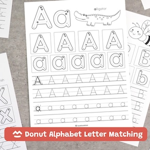 May include: A white educational worksheet featuring the letter A in uppercase and lowercase, with directional arrows for tracing, a line drawing of an alligator, and the text alligator and SookSookBrain printed on the page for handwriting practice.