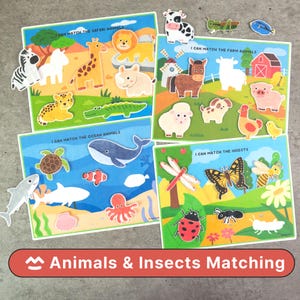 Pode incluir: Quatro tabuleiros de jogo de correspondência coloridos com temas de animais e insetos. Os tabuleiros apresentam cenas de safári, fazenda, oceano e insetos com recortes de animais e insetos correspondentes. O texto nos tabuleiros diz "I CAN MATCH THE...ANIMALS". Uma faixa vermelha na parte inferior diz "Animals & Insects Matching".