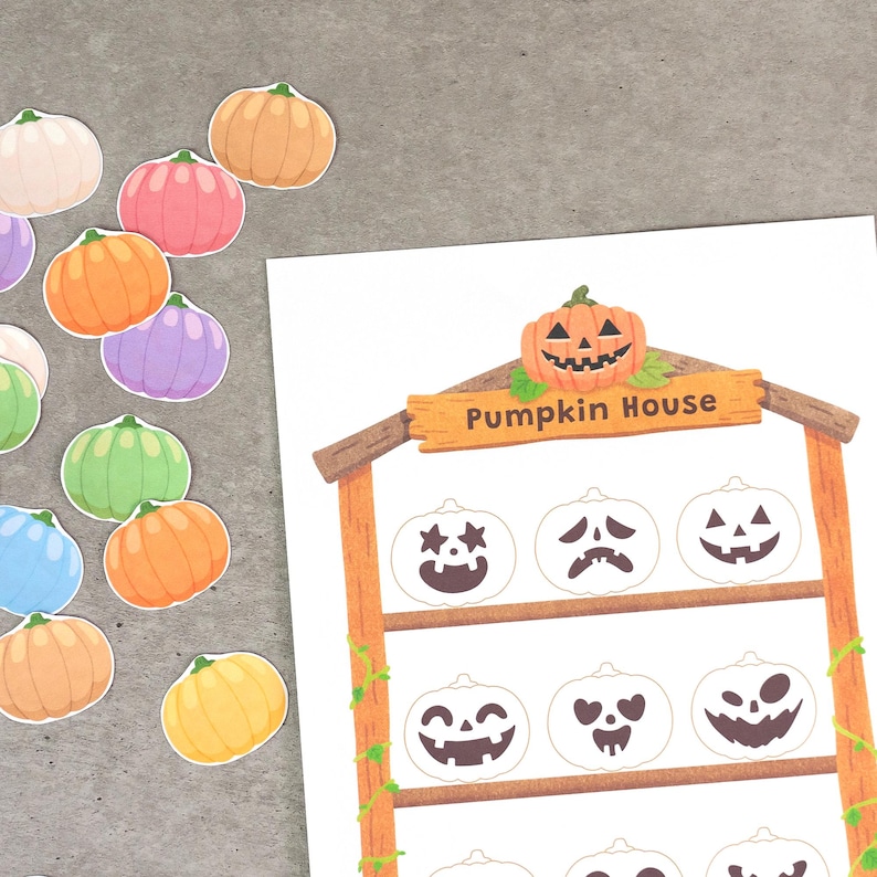May include: A Pumpkin House activity sheet featuring a wooden frame with a jack-o'-lantern topper and rows of blank pumpkin outlines with various facial expressions, accompanied by a collection of colorful pumpkin stickers in pastel shades.