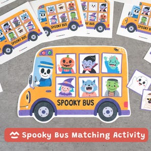 May include: A yellow school bus cutout with the text SPOOKY BUS, featuring a skeleton driver and windows displaying cartoon characters including a pumpkin, vampire, zombie, witch, werewolf, and Frankenstein-style monster.