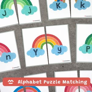 May include: Alphabet puzzle matching game featuring colorful rainbow designs and letters of the alphabet. Each card has a rainbow and a letter, with both uppercase and lowercase letters. The text "Alphabet Puzzle Matching" is displayed.