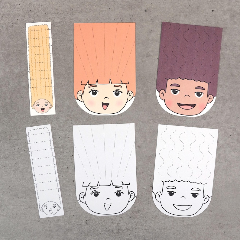 May include: A collection of colorful paper cutouts featuring cartoon faces with various hairstyles. The cutouts include orange, purple, and white designs, with dotted lines for cutting and folding. The faces have smiling expressions.