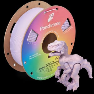 May include: A light purple 3D-printed dinosaur figure stands next to a spool of lavender-colored 3D printing filament. The spool has a gradient color palette and the brand name "Panchroma". The filament spool weighs 1 kg.