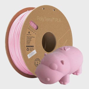 May include: A pink 3D printing filament spool labeled "PolyTerra PLA" next to a 3D-printed pink hippopotamus figurine. The spool is made from recycled materials. The hippo has a textured surface.
