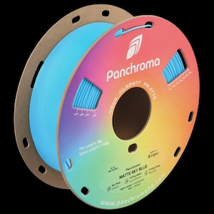 May include: A spool of light blue 3D printer filament labeled "Panchroma Matte Sky Blue." The spool is on a cardboard core with a colorful gradient label. The net weight is 1 kg.