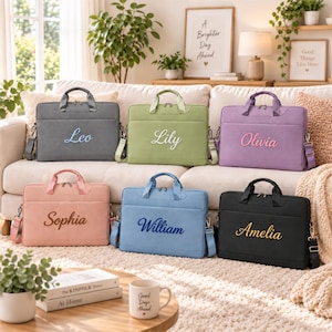 May include: Six rectangular laptop bags in grey, light green, purple, pink, blue, and black. Each bag features two top handles, a detachable shoulder strap, and a personalised name embroidered in a cursive font on the front centre panel.