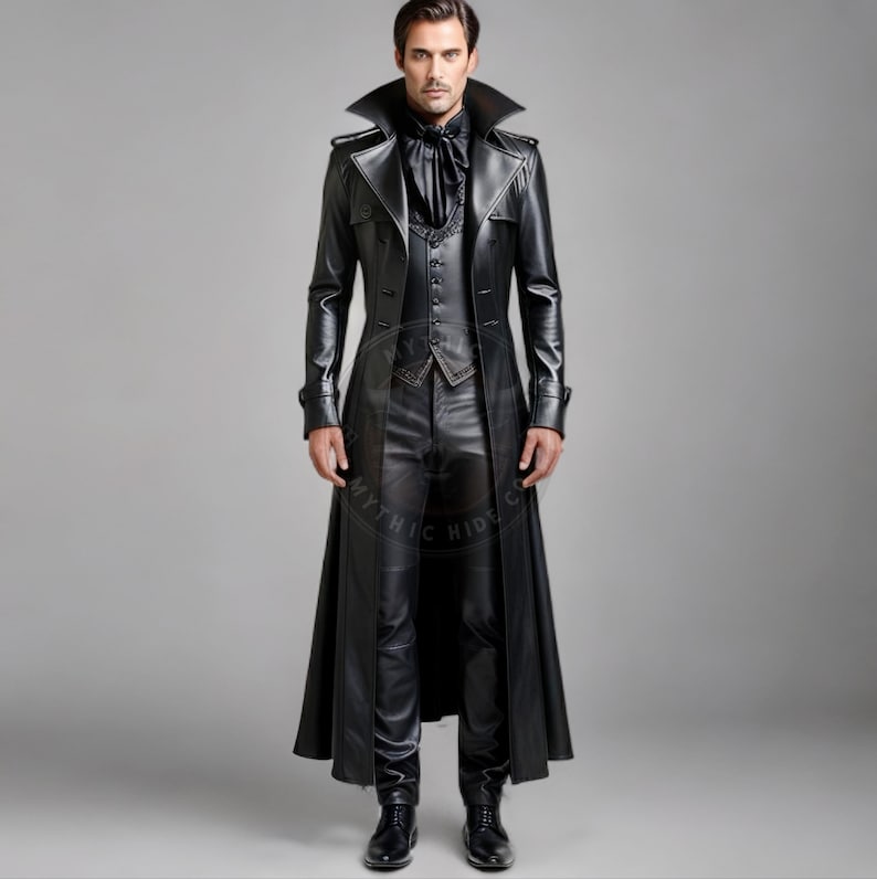 Front and back view of a men’s black leather vampire costume, featuring a long gothic trench coat, buttoned Victorian waistcoat, and slim-fit leather pants. The outfit is styled with a high collar and dramatic tailoring, suitable for cosplay, LARP, Halloween, and gothic fashion. Photographed in a neutral studio setting to highlight the real leather texture and structured silhouette.