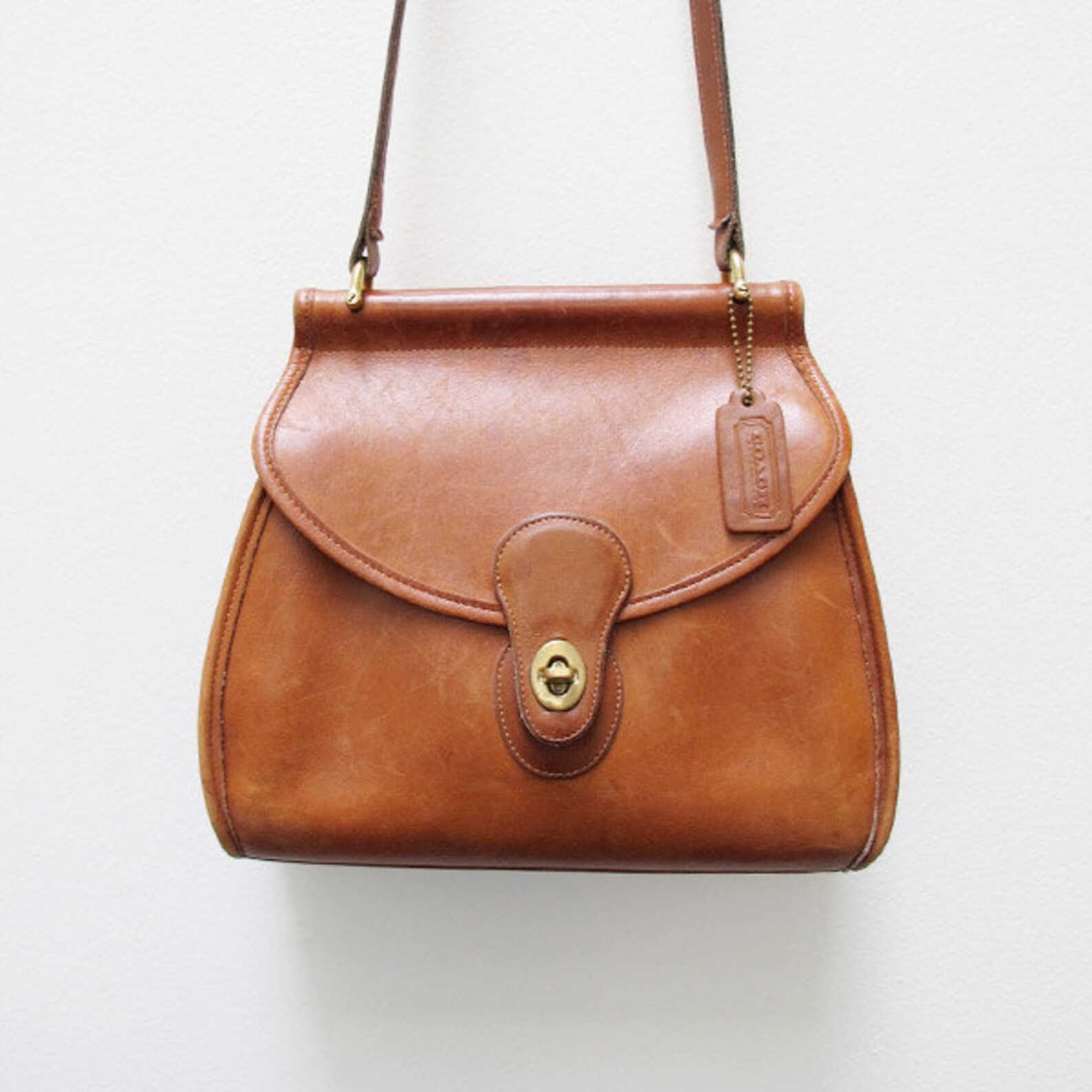 tan leather coach