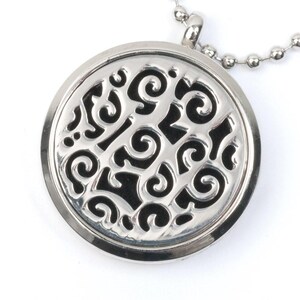 Collar con medallón de aromaterapia Es-Scent-ialsª - Redondo con espirales