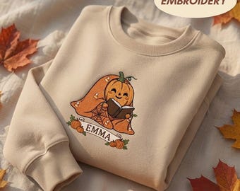 Custom Reading Pumpkin Embroidered Sweatshirt, Personalized Bookish Ghost Crewneck, Spooky Season Fall Pullover Top For Book Lovers