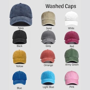 May include: A collection of washed baseball caps in various colors, including navy, sand, white, black, grey, red, yellow, orange, army green, blue, light blue, and pink. The text "Washed Caps" is displayed at the top.
