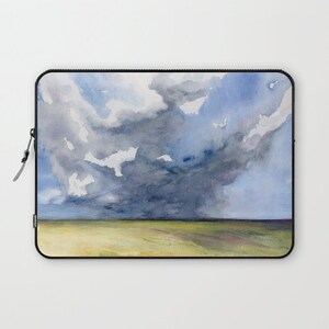 May include: A watercolor painting of a stormy sky over a field. The sky is a mix of blue, gray, and white, with dark clouds gathering in the distance. The field is a light green, with a few patches of yellow.