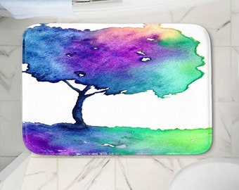 May include: A watercolor painting of a tree with a purple, blue, green, and yellow gradient. The tree is on a white background with a green and blue gradient at the bottom.