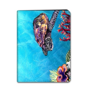 May include: A watercolour painting of a sea turtle swimming in blue water with coral and other sea life. The turtle is purple, yellow, and black. The coral is red and orange.