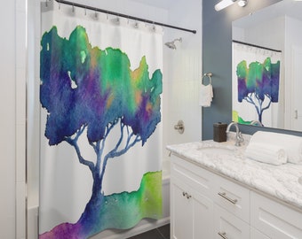 May include: A watercolour shower curtain featuring a stylised tree with blue, green, purple and yellow hues on a white background.