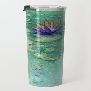 May include: A stainless steel travel mug with a green, blue, and purple watercolor design of a water lily on a pond. The water lily has a purple center and orange tips on the petals.
