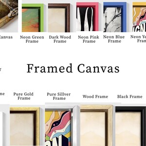 a collection of framed wall art, including various styles and colors, such as white, gold, silver, wood, black, and neon pink.