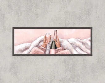 May include: A watercolour print featuring a champagne bottle and a glass of champagne. The bottle is pink and green, and the glass is filled with a pink liquid. The hands are wearing a pink sweater and holding the glass and bottle. The background is a light pink colour.