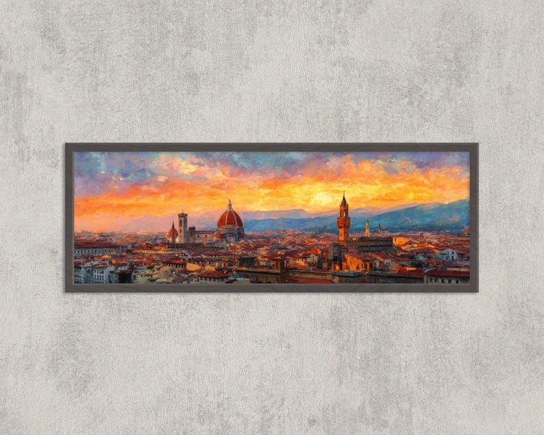 Pu&ograve; includere: Opera d'arte panoramica incorniciata raffigurante un paesaggio urbano al tramonto. Il dipinto presenta un cielo vibrante con tonalit&agrave; arancioni, gialle e blu. Sono visibili edifici con tetti di tegole rosse e una cupola prominente.