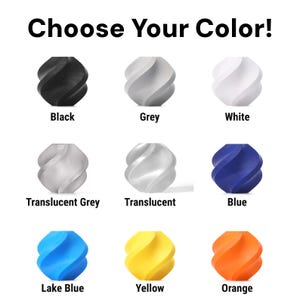 May include: Nine swirled, spherical objects in a range of colours: black, grey, white, translucent grey, translucent, blue, lake blue, yellow, and orange. Text at the top says "Choose Your Color!"