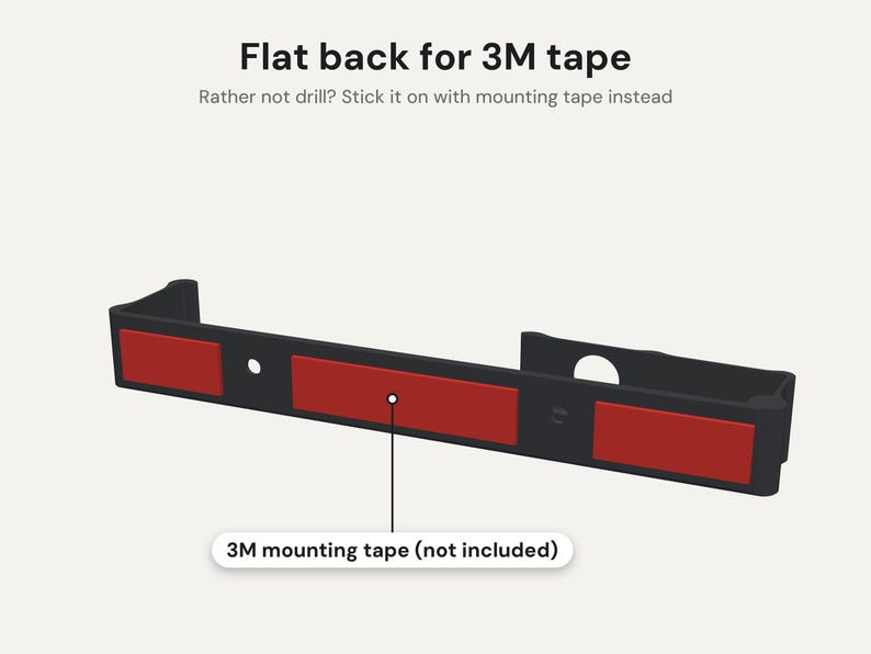 May include: A black, elongated mounting bracket with a flat back featuring three rectangular red adhesive strips. The text reads: Flat back for 3M tape, Rather not drill? Stick it on with mounting tape instead, and 3M mounting tape (not included).