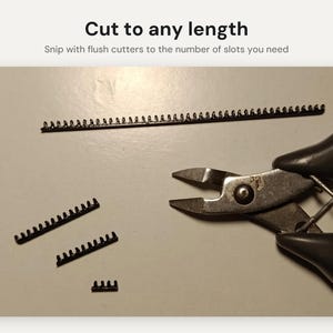 May include: A long, thin black plastic strip with multiple small slots, accompanied by a pair of metal flush cutters. The text "Cut to any length" and "Snip with flush cutters to the number of slots you need" is visible above the items.