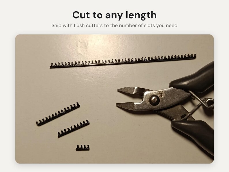 May include: A long, thin black plastic strip with multiple small slots, accompanied by a pair of metal flush cutters. The text "Cut to any length" and "Snip with flush cutters to the number of slots you need" is visible above the items.