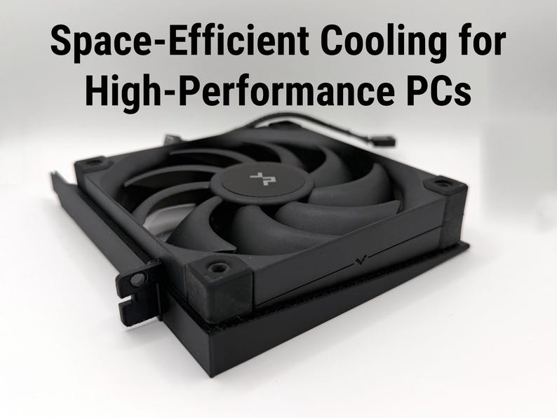 May include: Black computer fan with curved blades and a central hub. The fan is designed for high-performance PCs and is labeled "Space-Efficient Cooling for High-Performance PCs". The fan is made of black plastic and has a square shape.