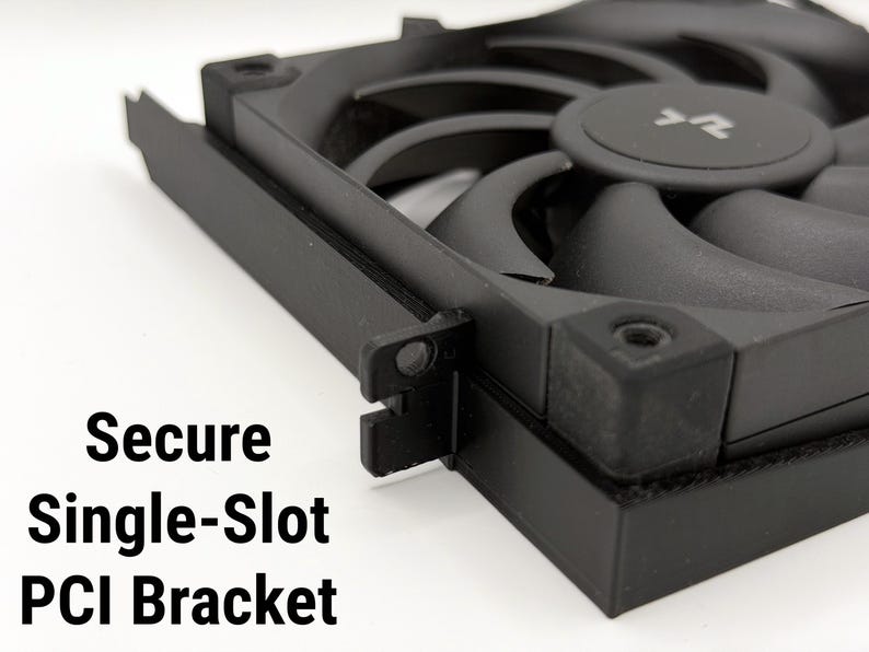 May include: A black single-slot PCI bracket with a fan. The fan has curved blades and a central hub. The text "Secure Single-Slot PCI Bracket" is visible in the image.