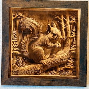 May include: A square wooden wall art piece featuring a detailed relief carving of a squirrel perched on a fallen log. The scene includes carved pine trees and forest elements, all finished in a dark brown wood stain within a matching frame.