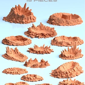 Op de afbeelding: Een verzameling van 15 oranje-bruine terreinstukken, ontworpen als kraters. De tekst bovenaan luidt "Scenery Terrain" en "Craters". De stukken variëren in grootte en vorm, met gekartelde randen en een getextureerd oppervlak.