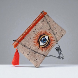 Handmade Evil Eye Clutch Bag with Tassel – Boho Embroidered Purse – Chain Strap Zipper Pouch – Spiritual Gift – Statement Accessory