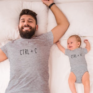 baby and father matching clothes