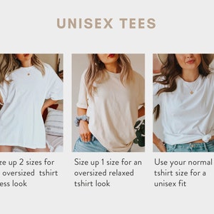 May include: Three women modelling different ways to wear a white unisex t-shirt. The first woman is wearing the shirt oversized as a dress. The second woman is wearing the shirt slightly oversized for a relaxed fit. The third woman is wearing the shirt in her normal size for a more fitted look.