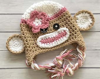 Pink newborn sock monkey hat, newborn to toddler sizes, crchet photo prop, color customization, sock monkey baby shower or nursery