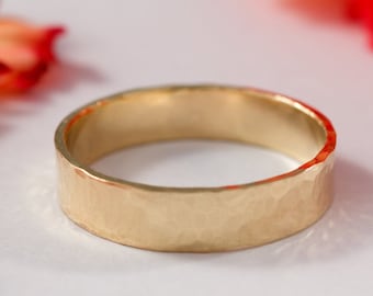 His and His Gold Wedding Band: A his and his pair of 9ct yellow eco gold wedding bands