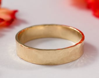 His and His Gold Wedding Band: A his and his pair of 18ct yellow eco gold wedding bands