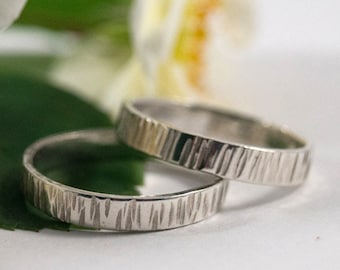 Gold Bark Effect Wedding Bands: A hers and hers set of 9k white eco gold textured wedding ring bands