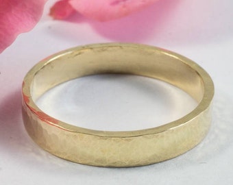 Gold Wedding Band: A 18k yellow eco gold textured wedding ring band