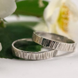 Silver Bark Effect Wedding Bands: A Set of hers and hers recycled sterling silver Bark effect wedding rings