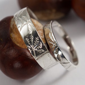 Horse Chestnut Wedding Bands: A Set of his and hers Recycled Sterling silver Horse Chestnut leaf textured wedding rings