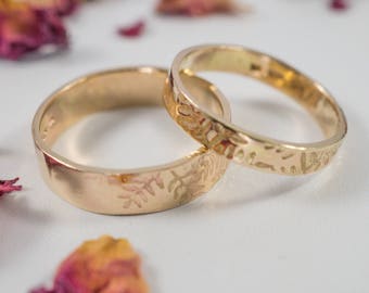 Gold Botanical Wedding Bands: A Set of his and hers textured 14k recycled gold wedding rings