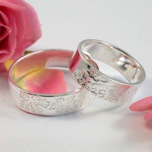 His and His Silver Botanical Wedding Bands: A pair of 5mm wide eco silver wedding bands image 2