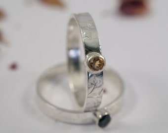 Citrine engagement Ring: A recycled sterling silver ring with a 2.5mm faceted citrine.