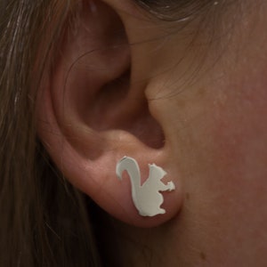 Silver Squirrel Earrings: A pair of squirrel shaped recycled sterling silver earrings.