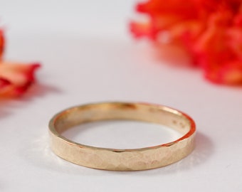 Gold Wedding Bands: A hers and hers set of 18k yellow recycled gold textured wedding ring bands