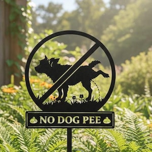 May include: Black metal garden sign with a silhouette of a dog urinating inside a circle with a slash through it. The sign reads "NO DOG PEE" in white text. The sign is in a garden with green plants and flowers.