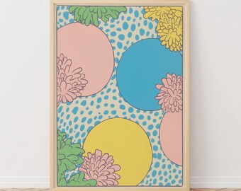 May include: A framed art print featuring a colorful, abstract design. The artwork showcases large circles in pink, blue, and yellow against a speckled background. Floral elements in green, pink, and yellow are incorporated throughout the design.